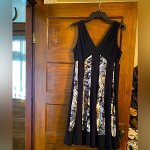 Very stylish, sexy dress, flattering for any figure, sz 14